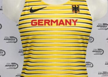 Nike Germany Pro Elite 2022 Women Distance Singlet yellow front view showing Nike swoosh and German eagle crest on mannequin