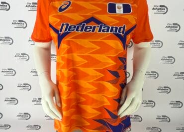 Asics Netherlands Pro Elite 2024 OLY Women T-Shirt orange front full view Nederland print geometric pattern mannequin