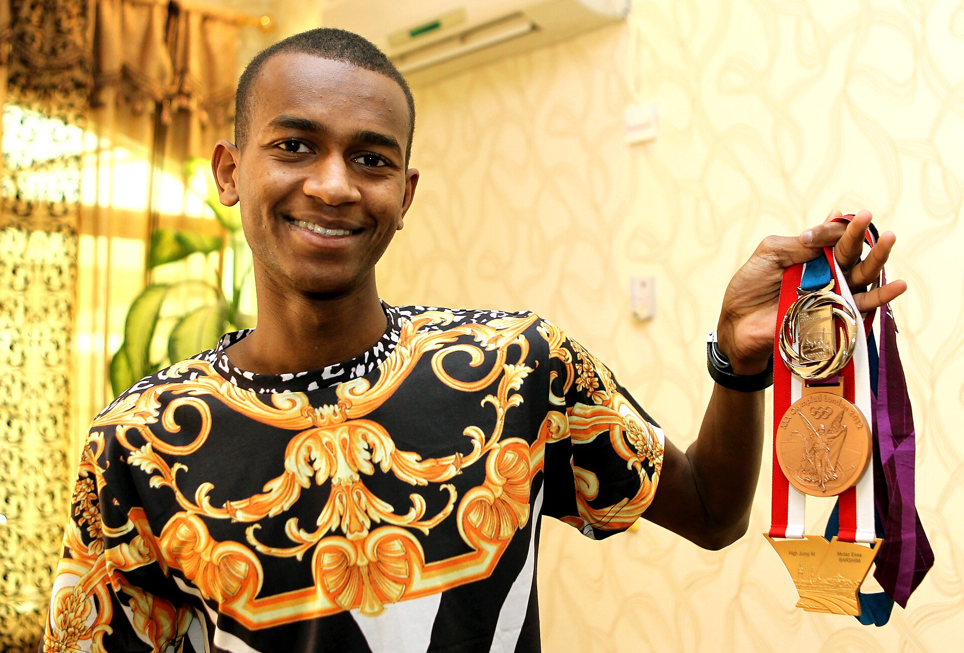 Mutaz Barshim competing in the high jump