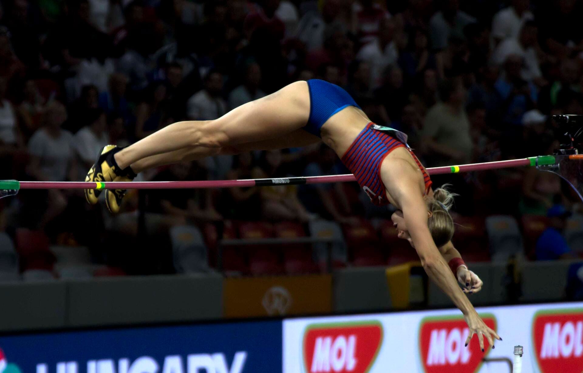 Katie Moon clearing the bar in the women's pole vault final at the 2023 World Championships in Budapest