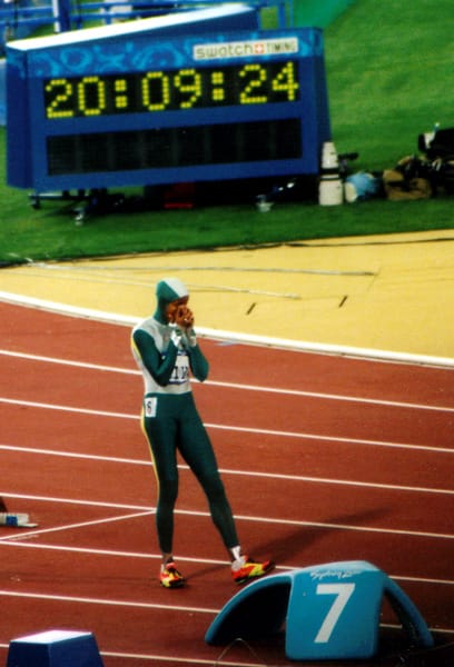 Cathy Freeman in the hooded Nike Swift Suit at the Sydney 2000 Olympics