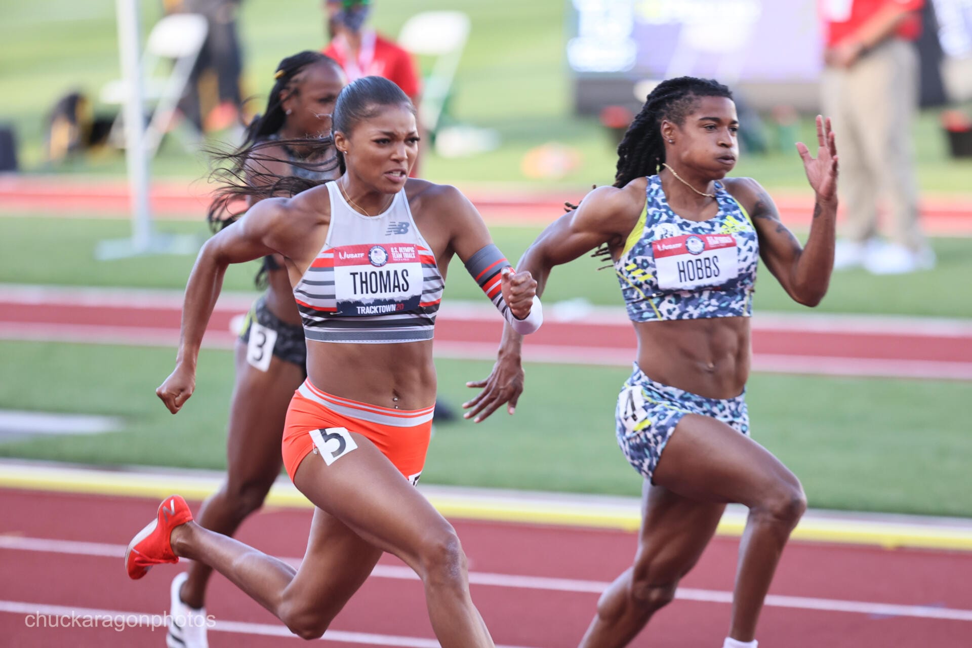 Gabby Thomas sprinting with a single arm sleeve at the 2021 US Olympic Trials
