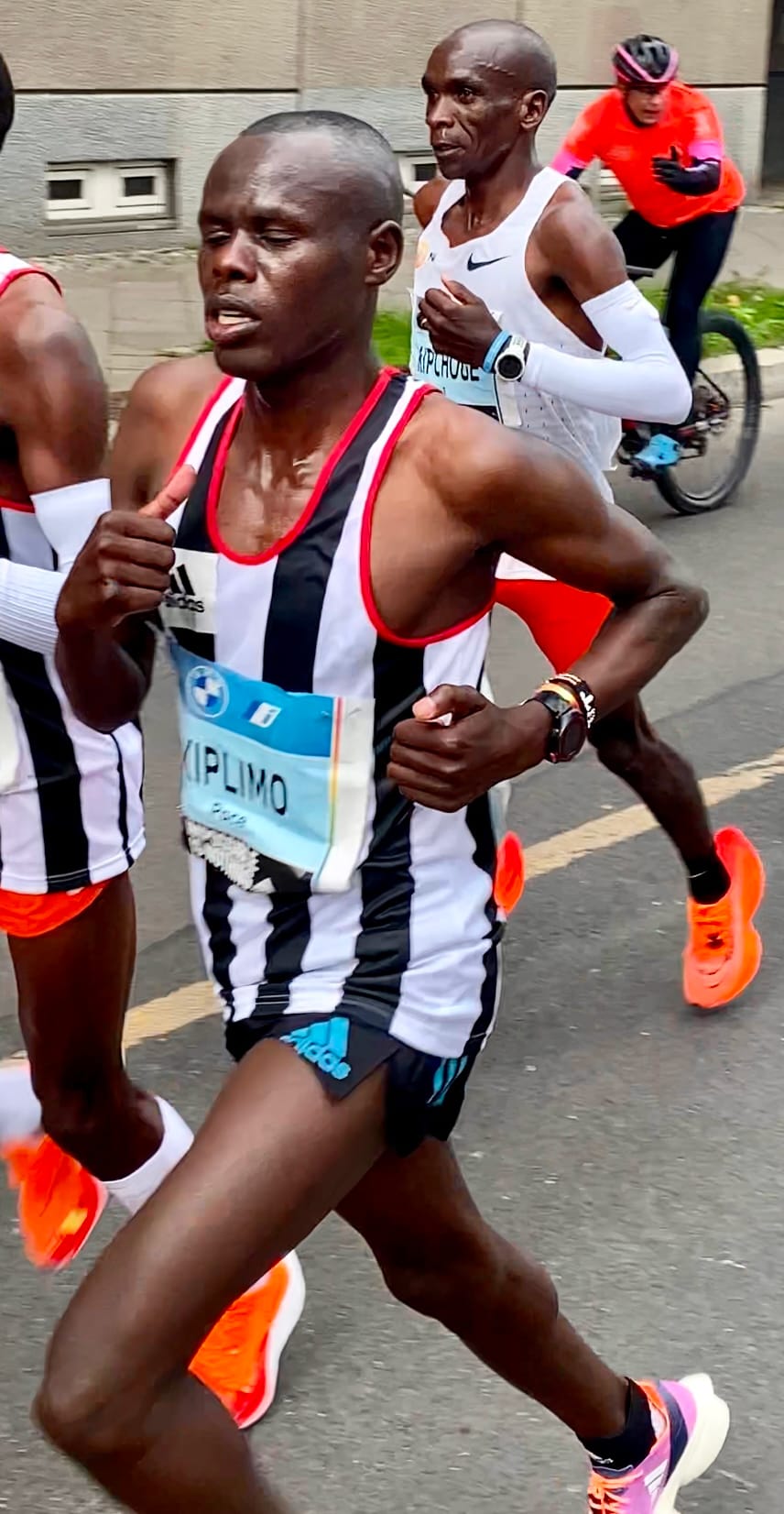 Eliud Kipchoge racing the 2022 Berlin Marathon in a race singlet that sits second-skin through the chest and torso