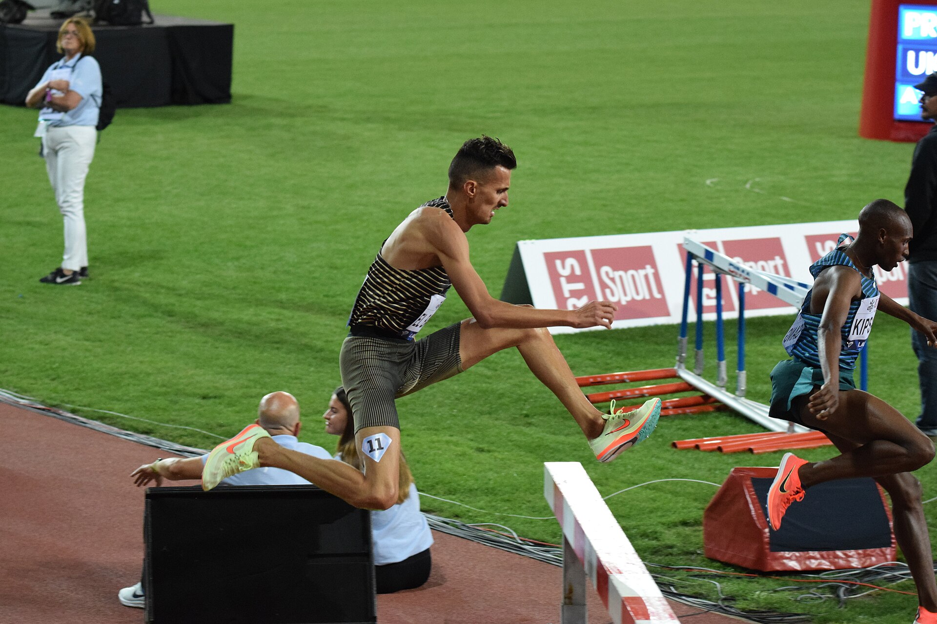 Soufiane El Bakkali clearing a barrier in a steeplechase at Athletissima, Lausanne