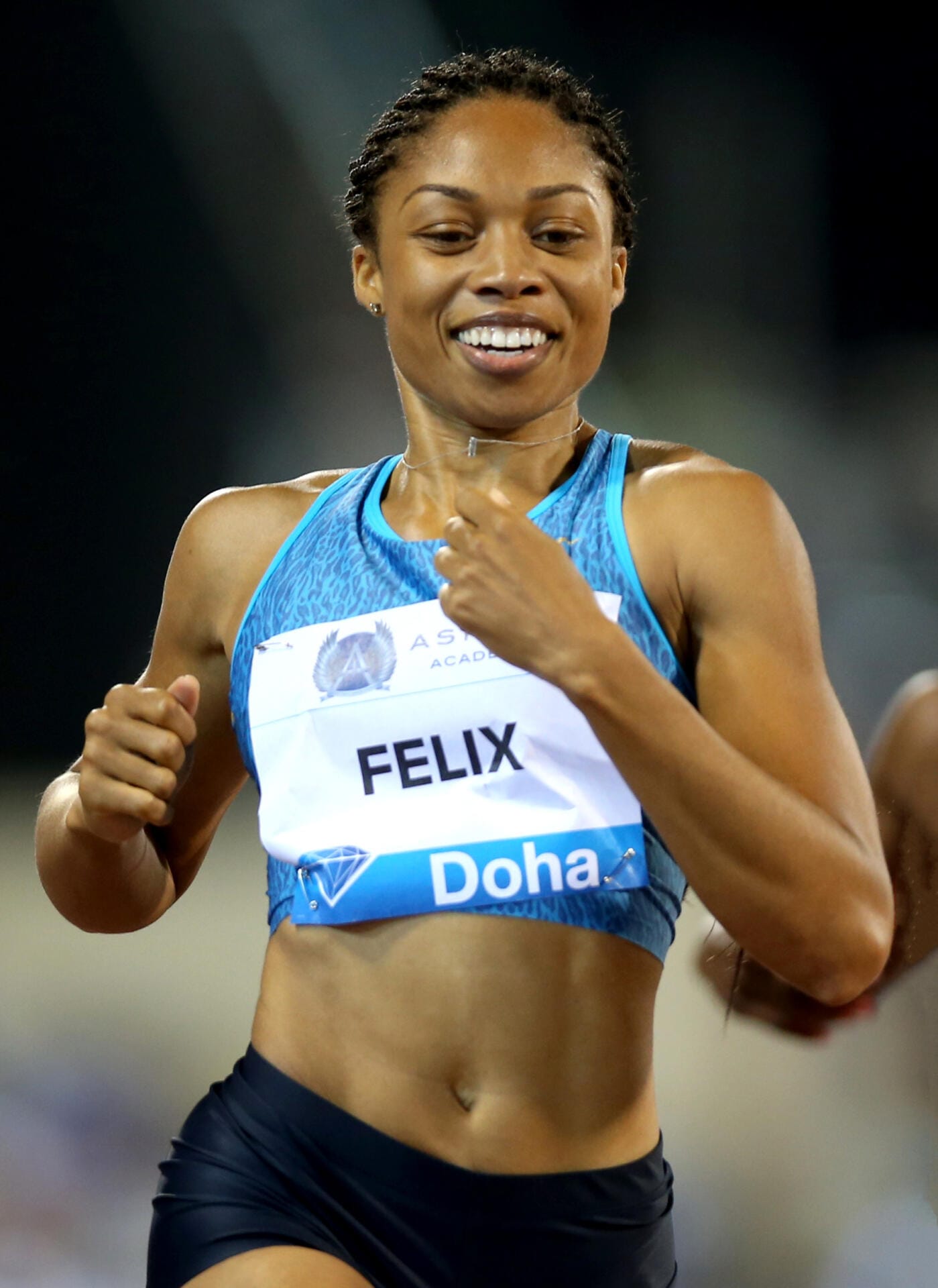 Allyson Felix racing at Doha in 2015