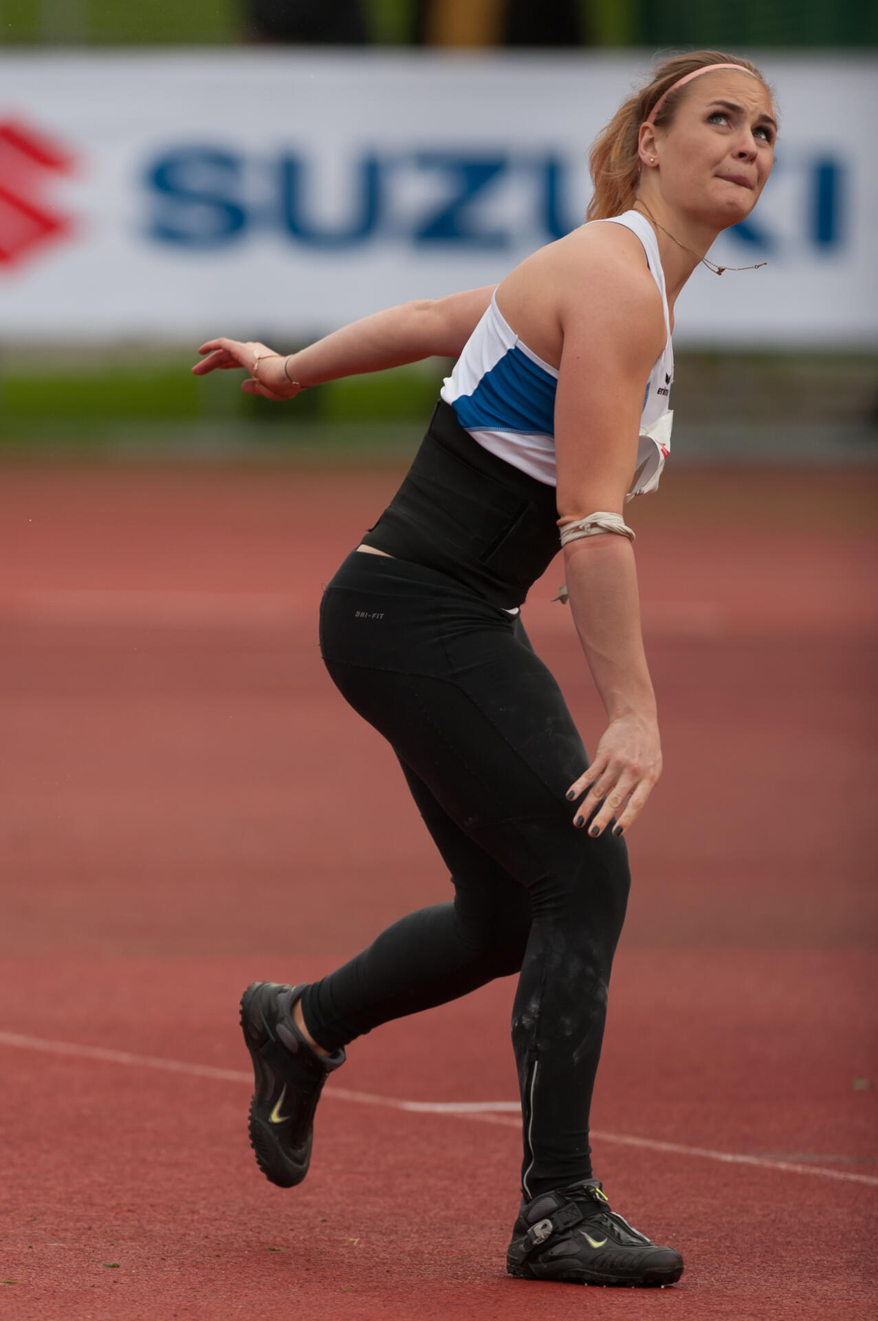 A young Victoria Hudson throwing the javelin in 2015