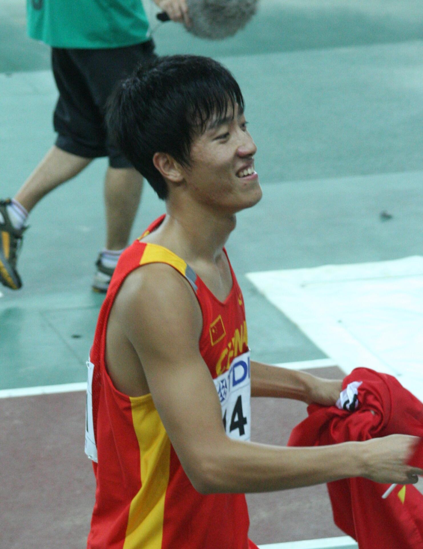 Liu Xiang celebrating his 110m hurdles world title in Osaka, 2007