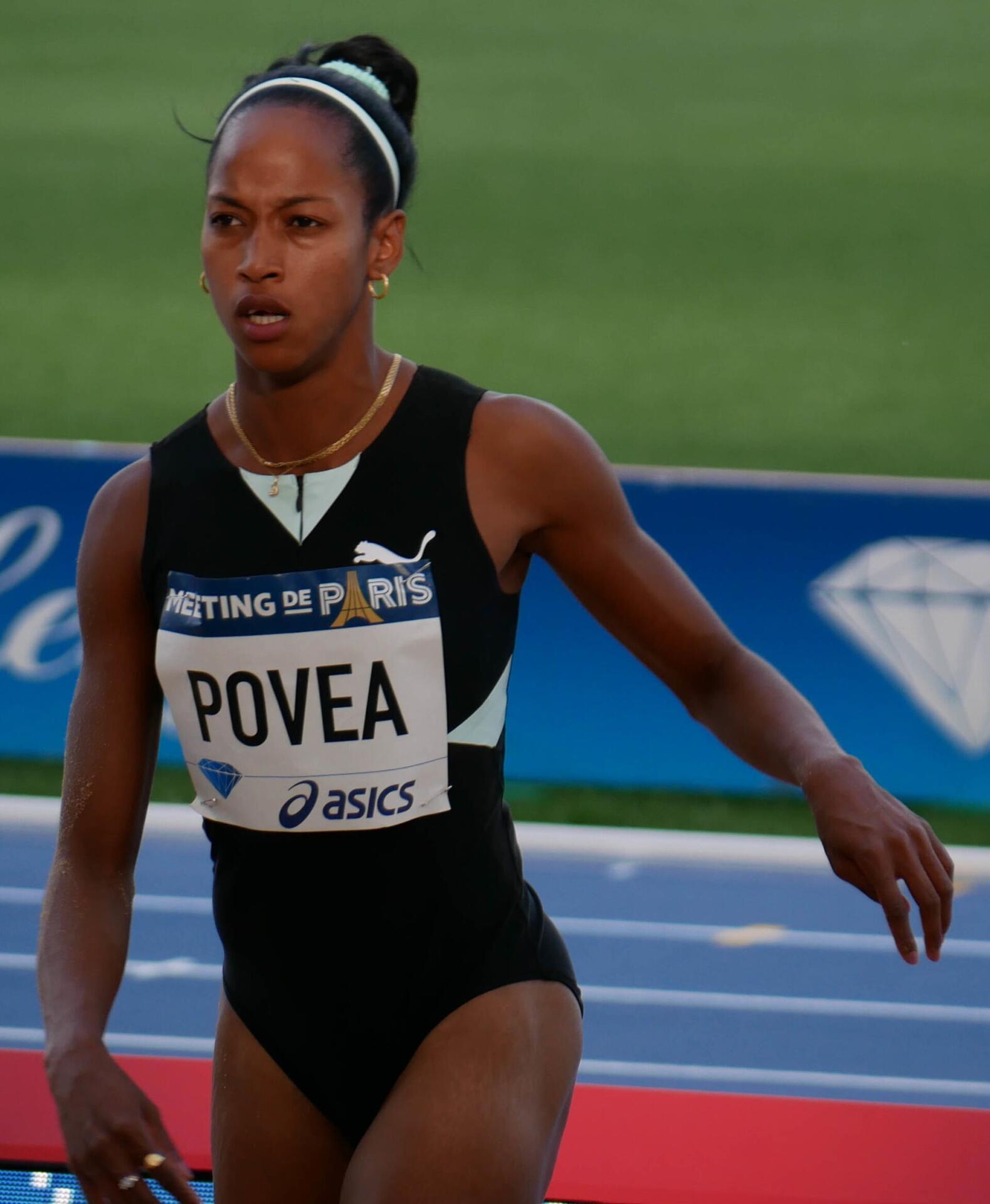 Liadagmis Povea of Cuba mid-flight in a triple jump competition