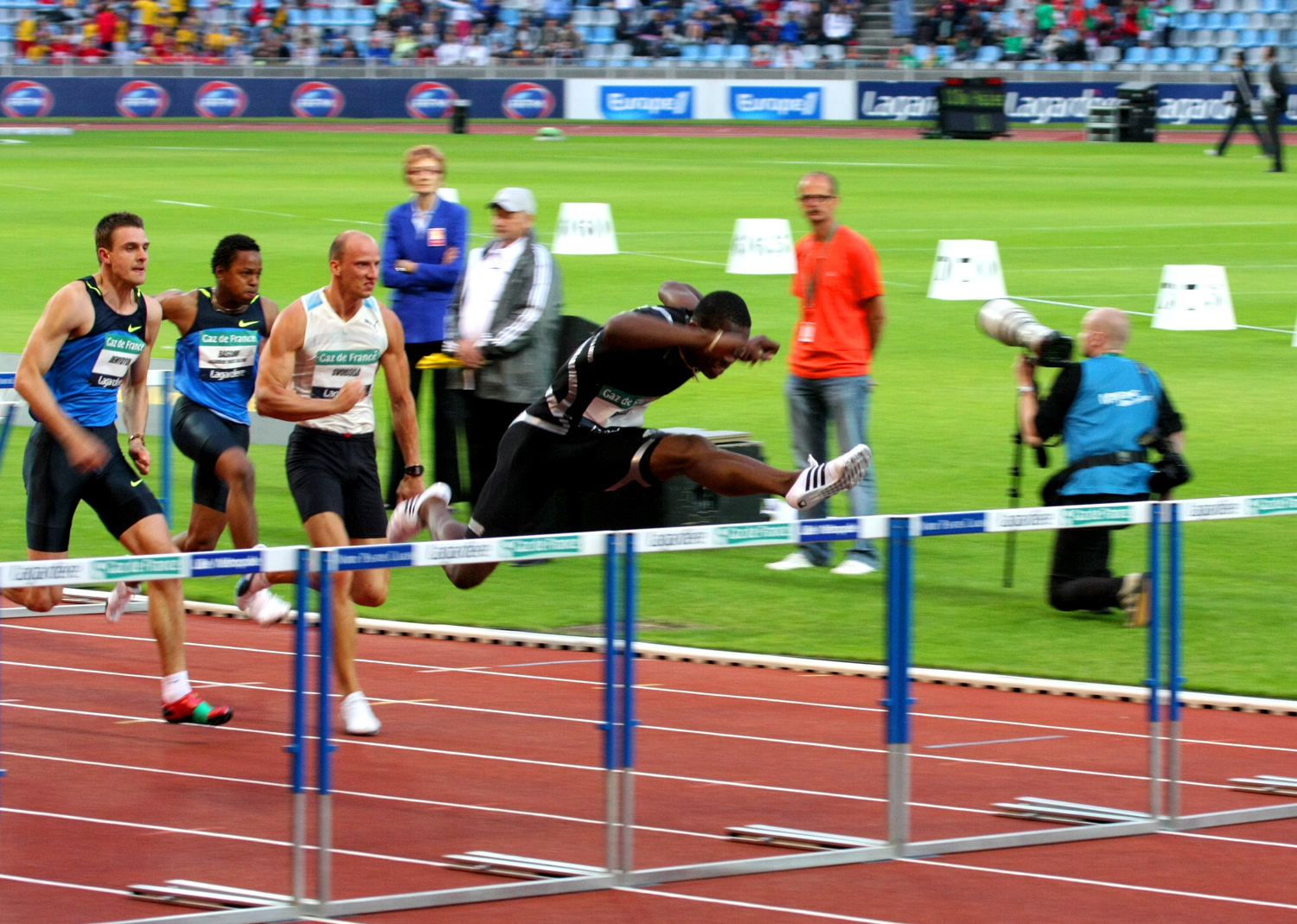 Dayron Robles of Cuba clearing a hurdle in a 110 m hurdles race