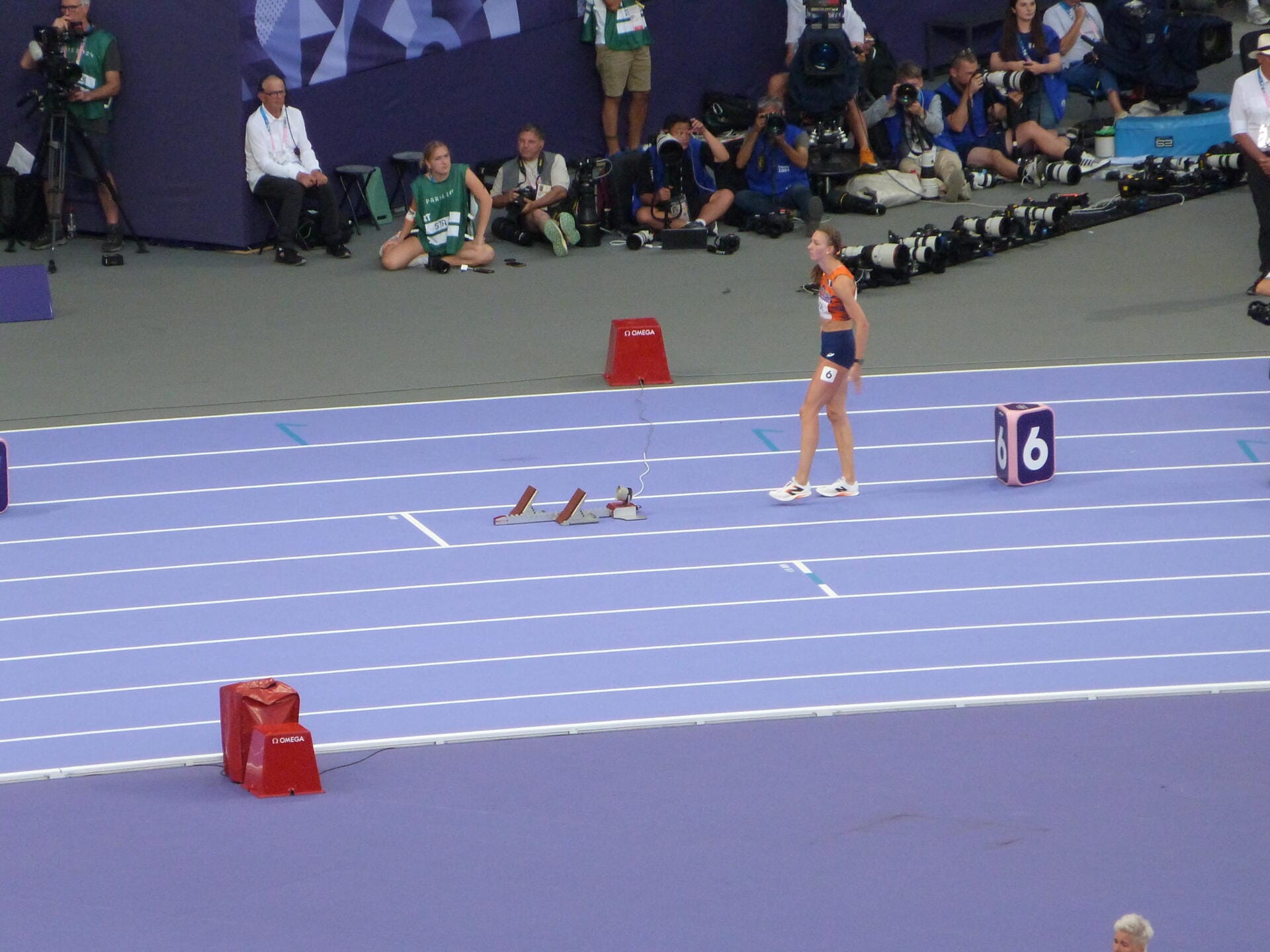 Femke Bol clearing a hurdle in the 400m hurdles semi-final at the Paris 2024 Olympics