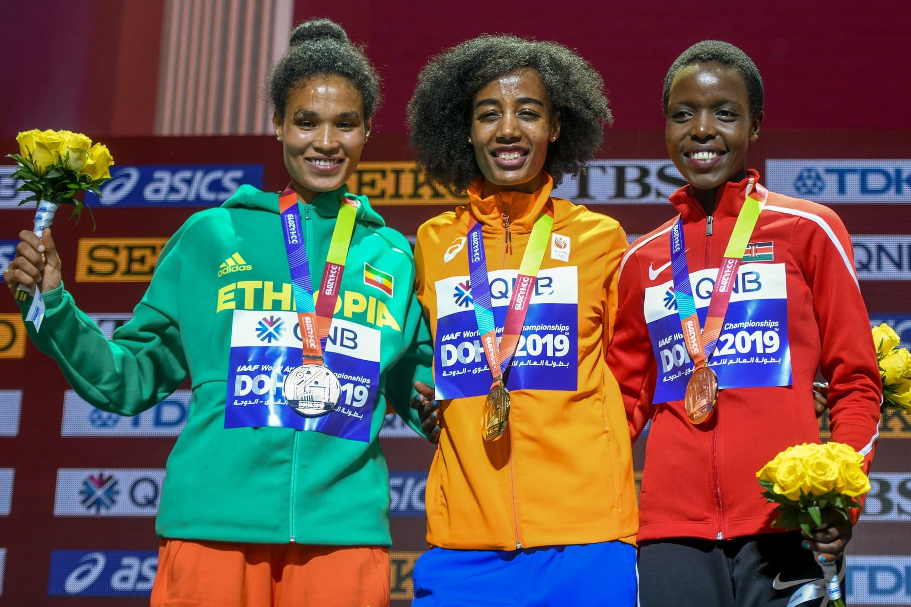The women's 10,000 m medal podium at the Doha 2019 World Championships