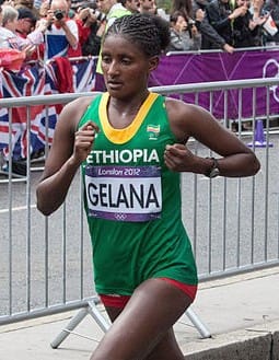 Tiki Gelana running the London 2012 Olympic marathon in the Ethiopia kit