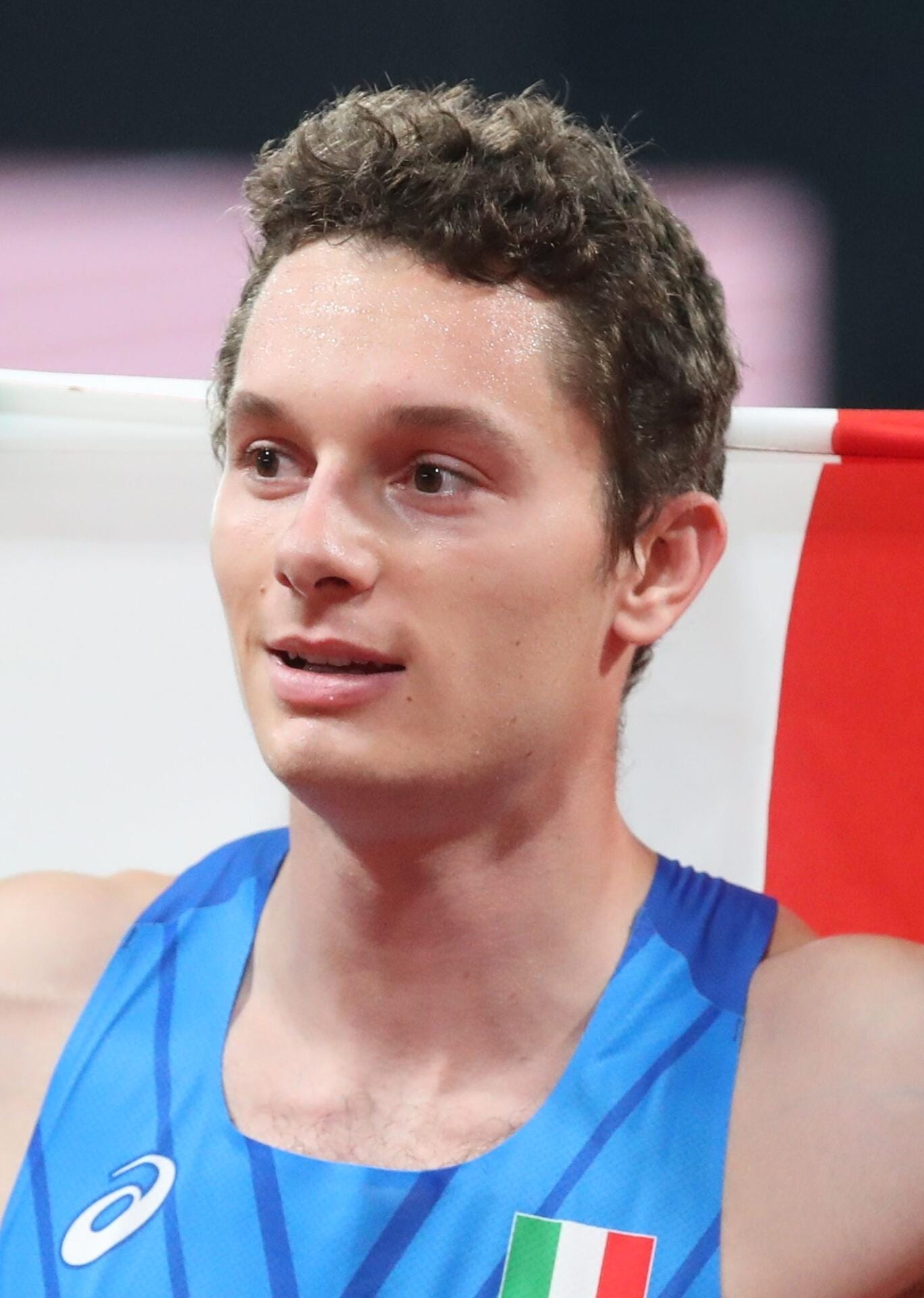 Filippo Tortu racing the 200 metres at the Munich 2022 European Championships