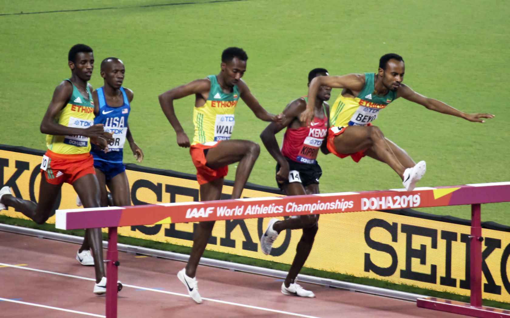 The men 3000 metres steeplechase final at the 2019 World Championships in Doha with Ethiopian athletes clearing a barrier